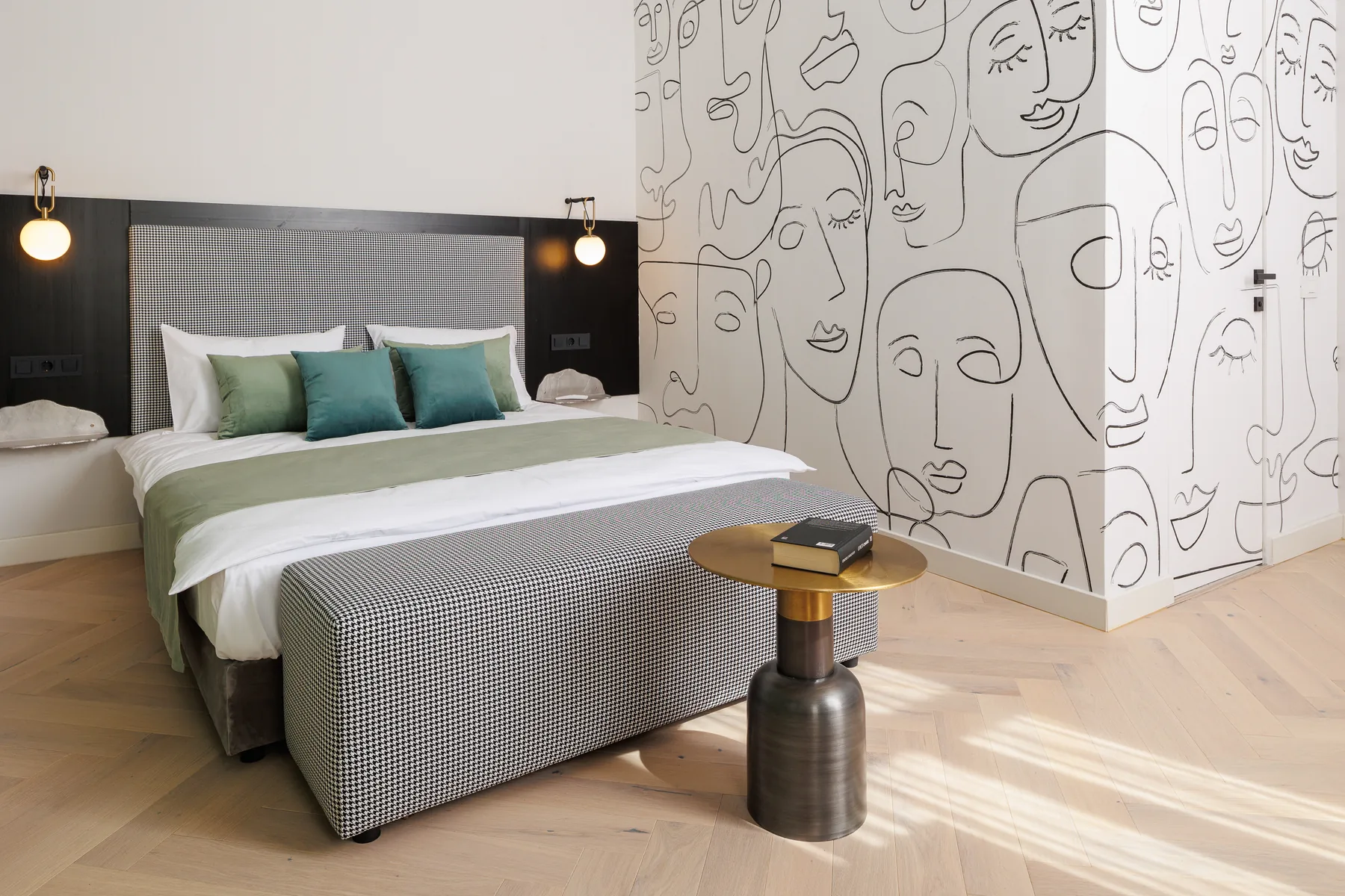 Renovated bedroom with a green wardrobe and illustrated partition